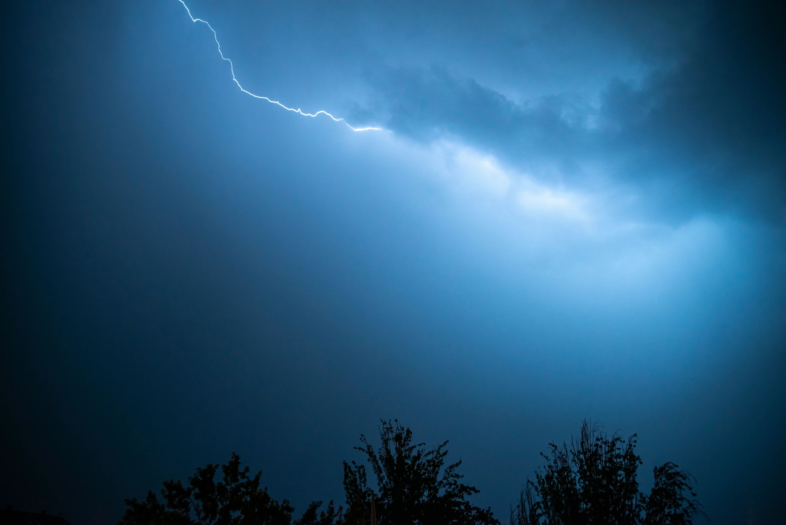 Lightning across a stormy night sky
