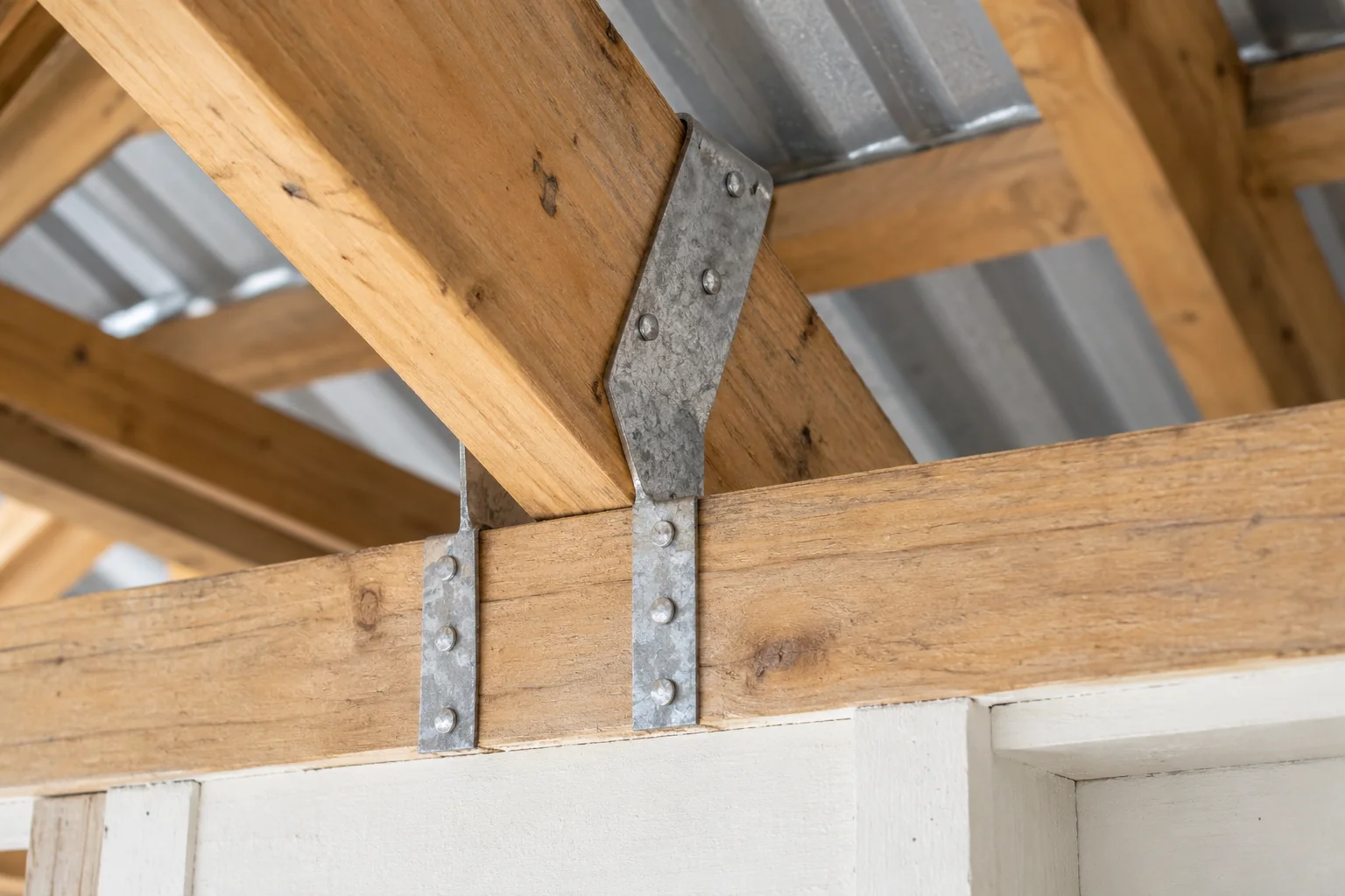 Roof to wall strap
